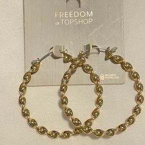 Gold hoop earrings by Topshop